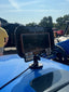 ADJUSTABLE CALLHAUL ON A BLUE TRACTOR HOLDING A PINK PHONE