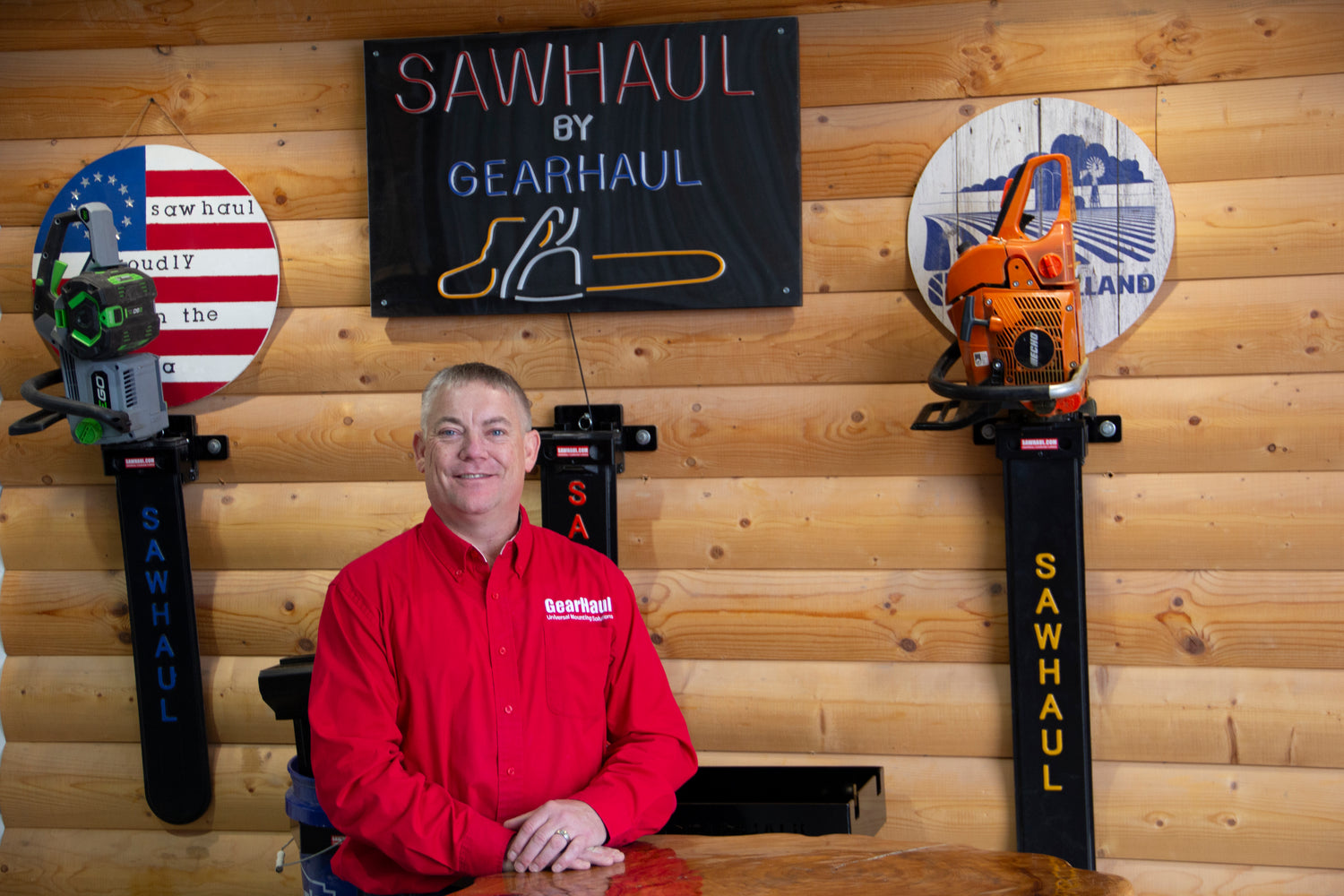Kenny by the wood wall. 