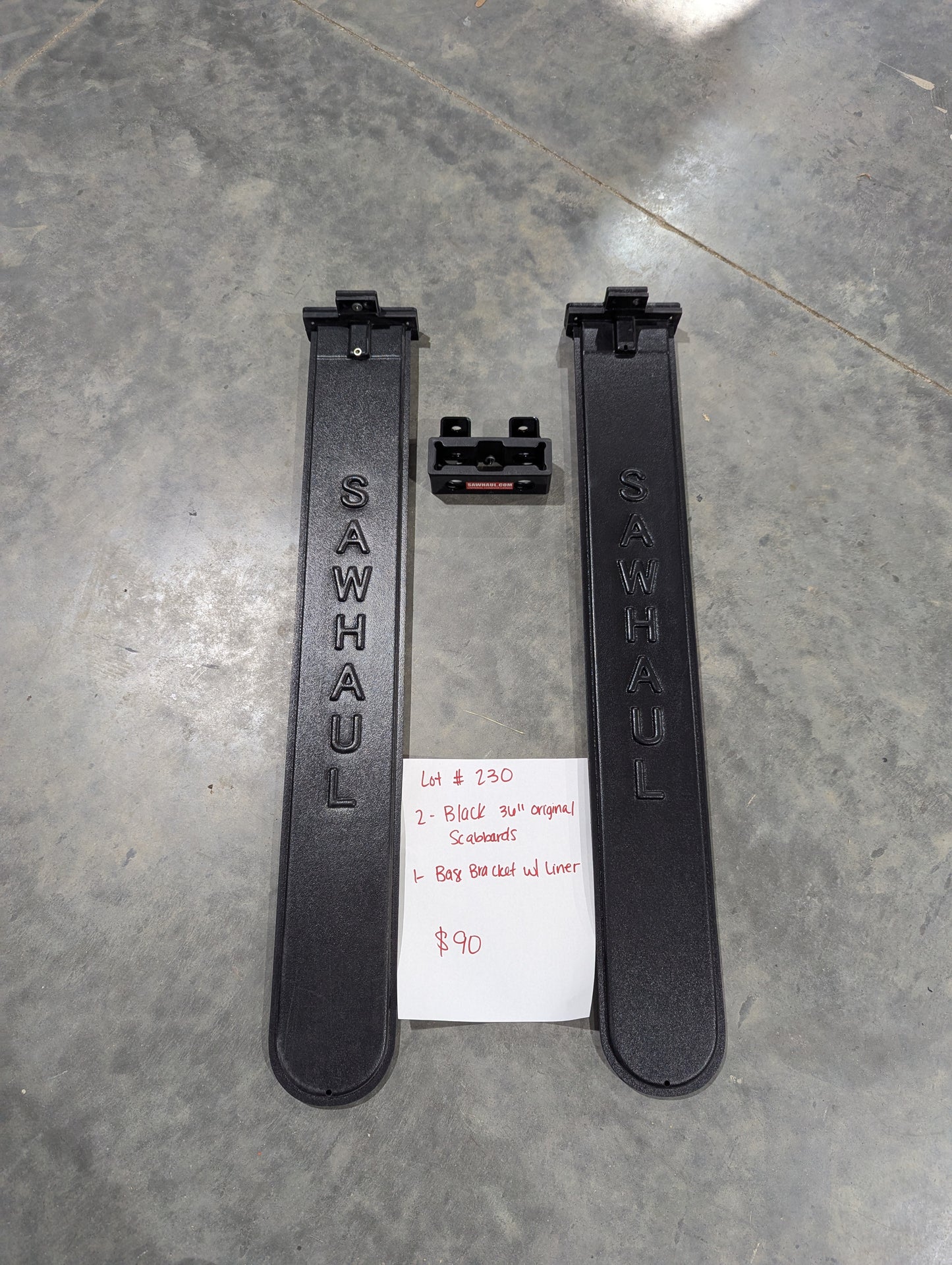 2 BLACK 36" SCABBARDS AND BASE BRACKET WITH LINER LOT