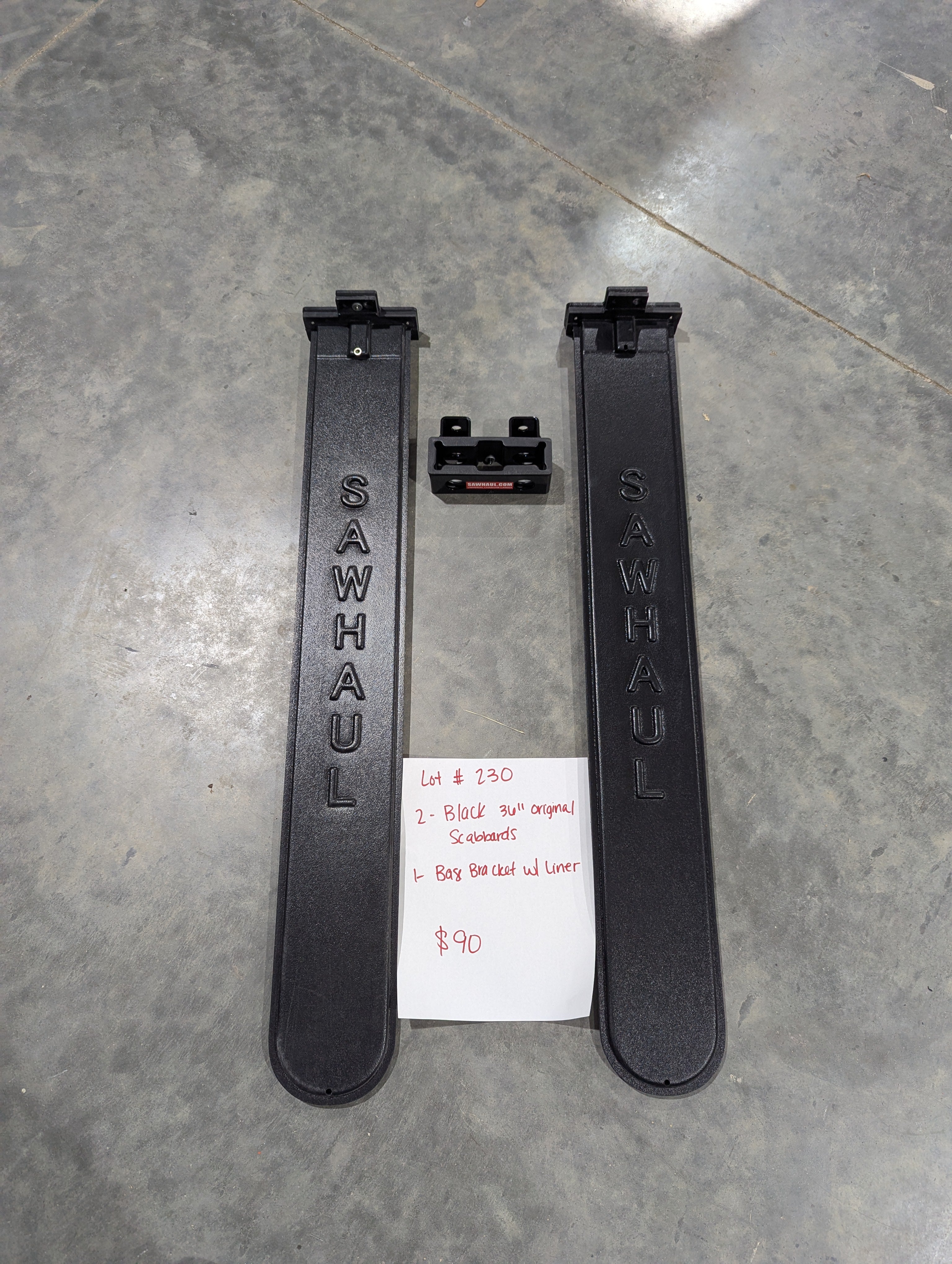 2 BLACK 36" SCABBARDS AND BASE BRACKET WITH LINER LOT