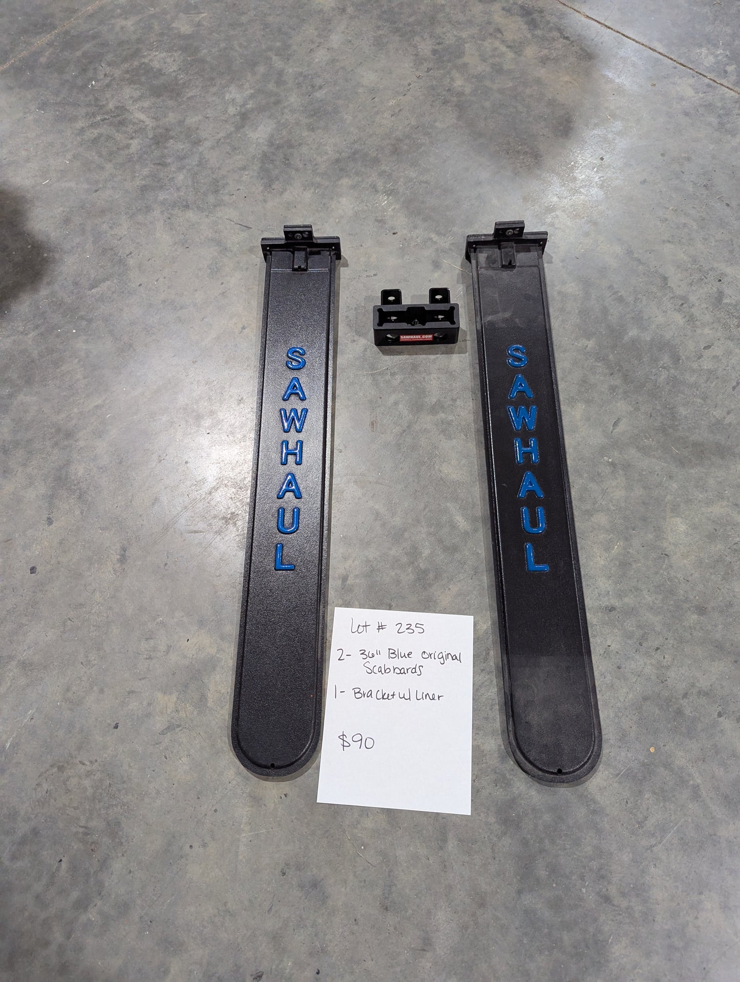 2 36" BLUE SCABBARDS AND BASE BRACKET WITH LINER LOT