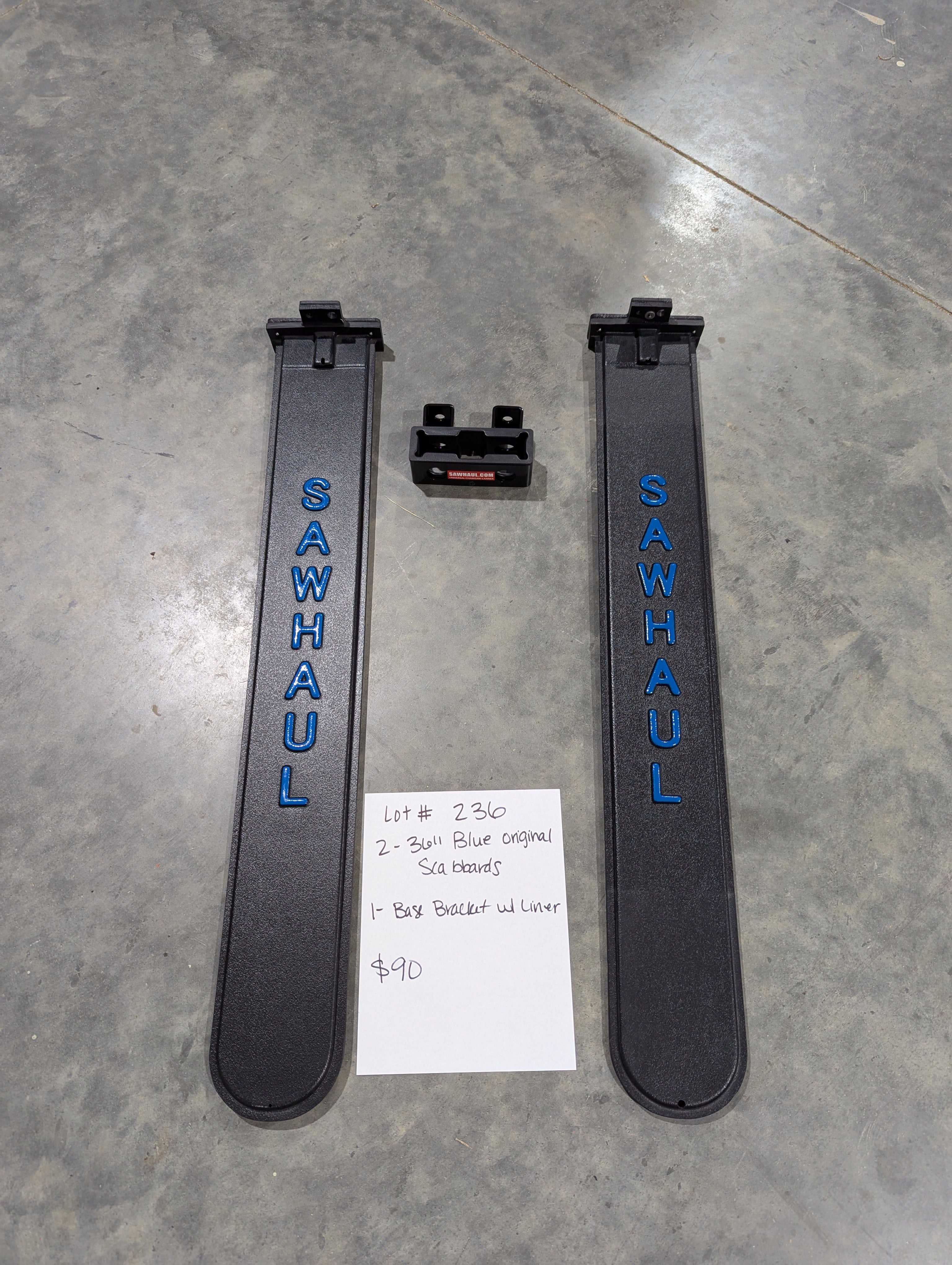 2 36" BLUE SCABBARDS AND BASE BRACKET WITH LINER LOT