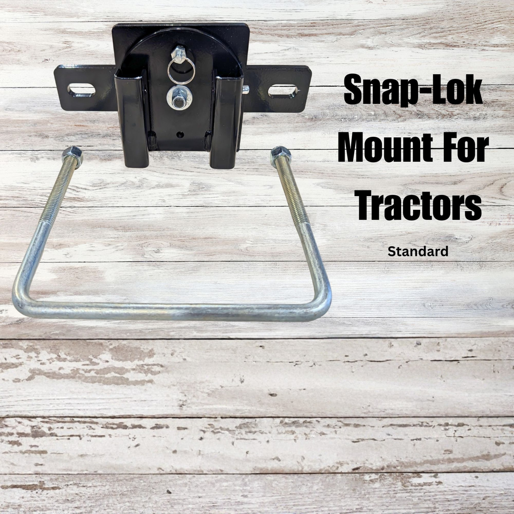 Snap-Lok mount for tractors on a wooden surface with text overlay.