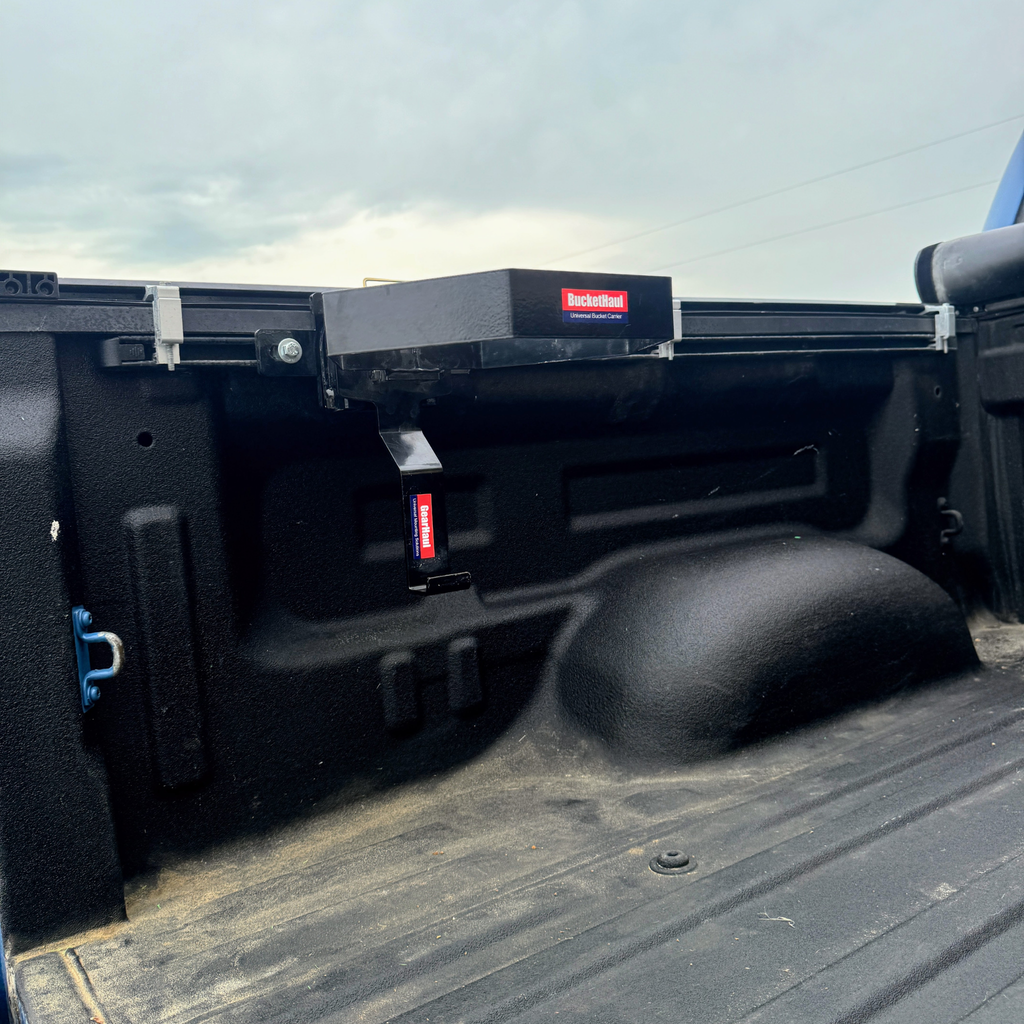 Toyotal Truck bed with a Buckethaul and visible branding attached to bed rail.